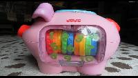 Видео обзоры игрушек- Свинка копилка Fisher Price